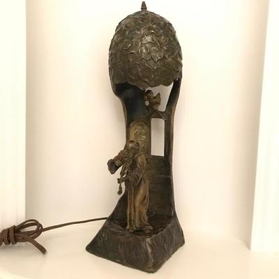Lot 161 - Brass Lamp with Monk and Cherub