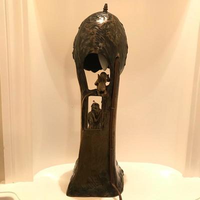 Lot 161 - Brass Lamp with Monk and Cherub