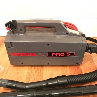 Lot 206 - Two Oreck XL and Little Helper Vac