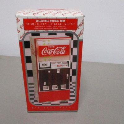 Lot 20 - Coca Cola Die Cast Vending Machine Musical Bank