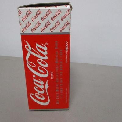 Lot 20 - Coca Cola Die Cast Vending Machine Musical Bank