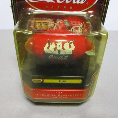 Lot 23 - Matchbox Coca-Cola Seaplane & Blimp