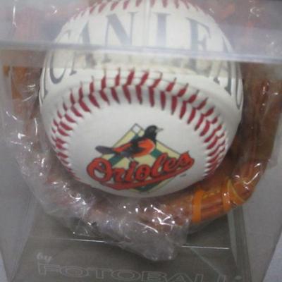 Lot 43 - Cal Ripken Baltimore Orioles Baseball & Mini Glove & Plaque