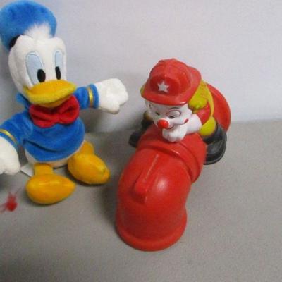 Lot 63 - Sesame Street Doctor's Kit - Bath Tub Clown Fireman Spout