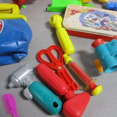 Lot 63 - Sesame Street Doctor's Kit - Bath Tub Clown Fireman Spout