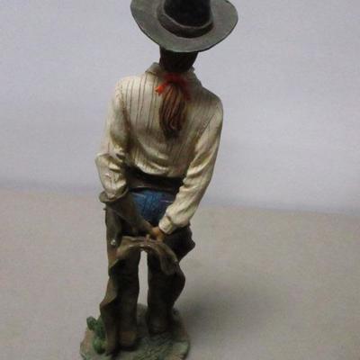 Lot 186 - Cowgirl & Cowboy Statues