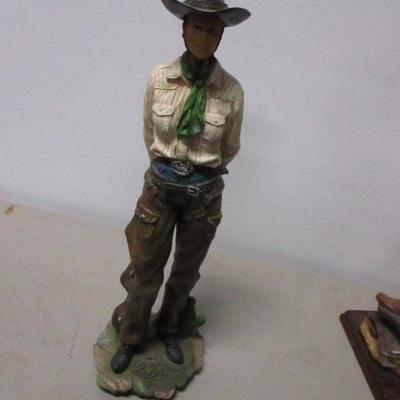 Lot 186 - Cowgirl & Cowboy Statues