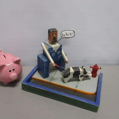 Lot 194 - Pig Bank & Man & Pig Model