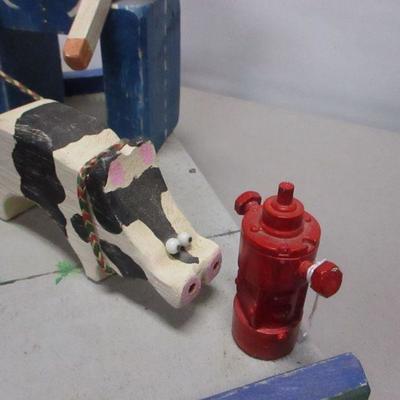 Lot 194 - Pig Bank & Man & Pig Model