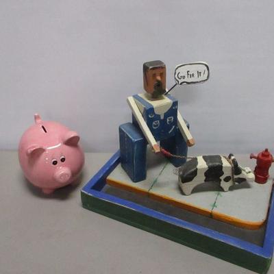 Lot 194 - Pig Bank & Man & Pig Model