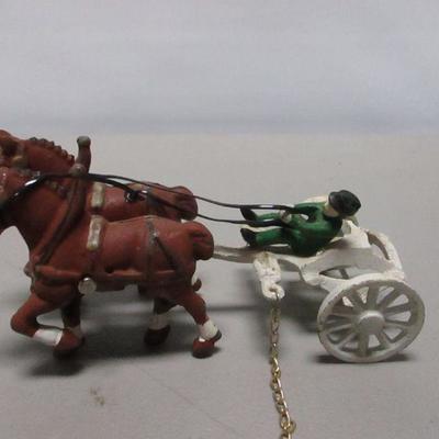 Lot 203 - Cast Iron Horse & Man