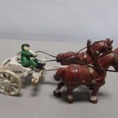 Lot 203 - Cast Iron Horse & Man