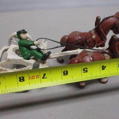 Lot 203 - Cast Iron Horse & Man