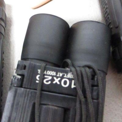 Lot 223 - Bushnell Binoculars - DVDs - Kodak Camera - Dirt Devil
