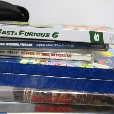 Lot 223 - Bushnell Binoculars - DVDs - Kodak Camera - Dirt Devil