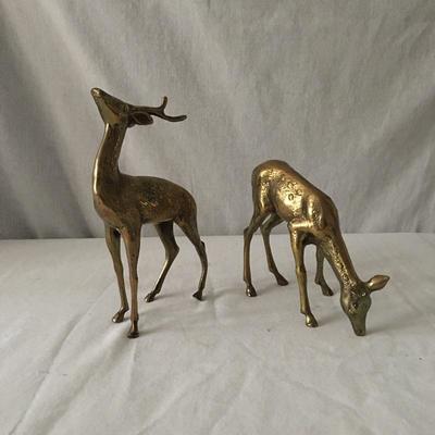 Lot 50 - Brass Deer & Candlesticks