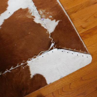 Cow Hide Rug with Leather Stitiching 60