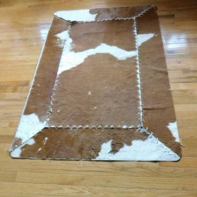 Cow Hide Rug with Leather Stitiching 60