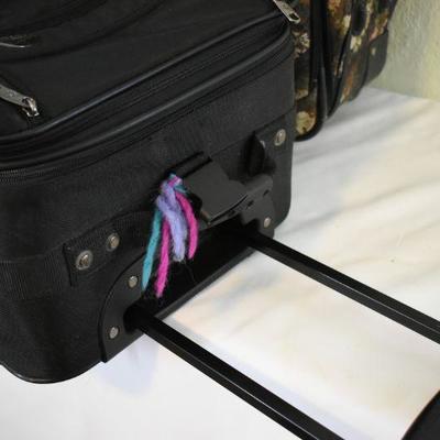 Lot G-123:  Luggage