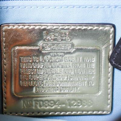 Lot G-128:  Coach