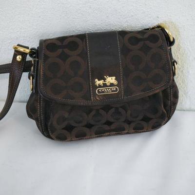 Lot G-128:  Coach