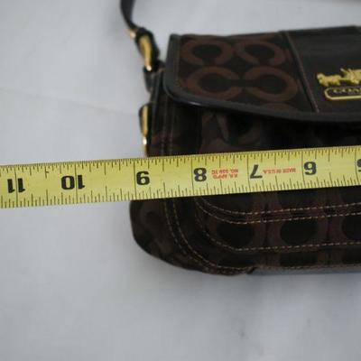 Lot G-128:  Coach