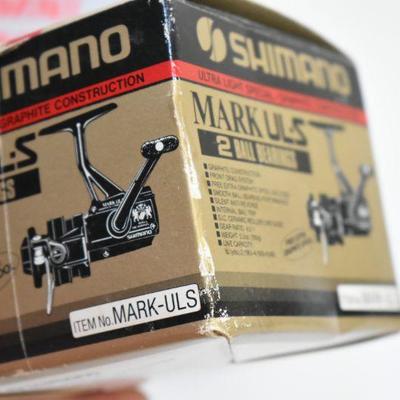 Lot B-117: Shimano Mark UL-S and Shakespeare Omni 035 Reels with Boxes