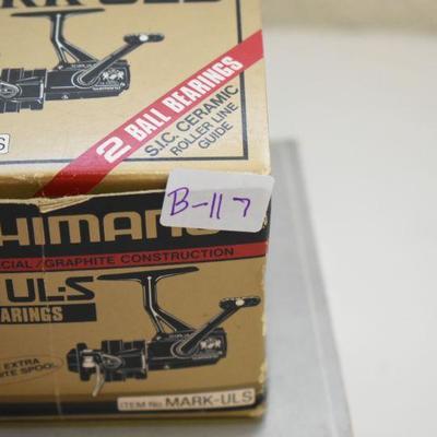 Lot B-117: Shimano Mark UL-S and Shakespeare Omni 035 Reels with Boxes