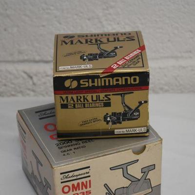 Lot B-117: Shimano Mark UL-S and Shakespeare Omni 035 Reels with Boxes