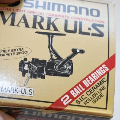 Lot B-117: Shimano Mark UL-S and Shakespeare Omni 035 Reels with Boxes