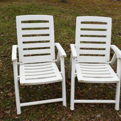 Lot O-18: Two White Folding Plastic Chairs