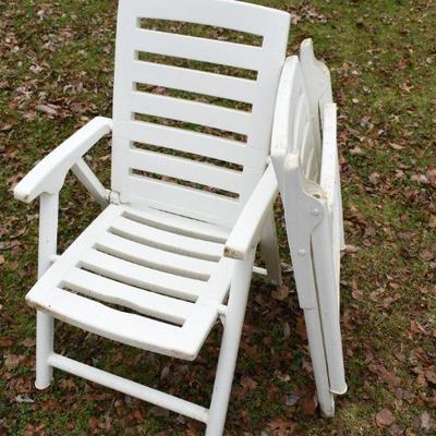 Lot O-18: Two White Folding Plastic Chairs
