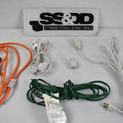 4 Extensions Cords (1 Orange 1 Green 2 White) and 1 plug adapter