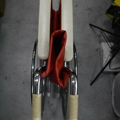 Red/Tan Wheelchair by Rolls Invacare