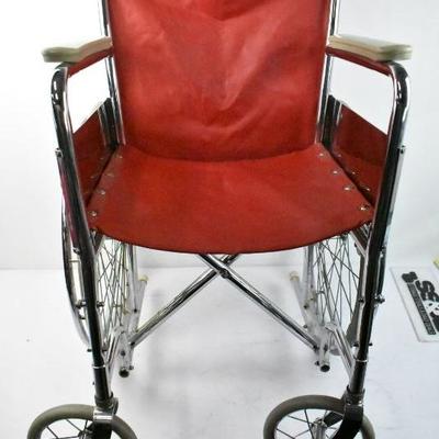 Red/Tan Wheelchair by Rolls Invacare