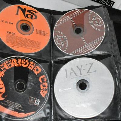 67 Music CDs in Case Logic. Mostly Rp & Hip Hop