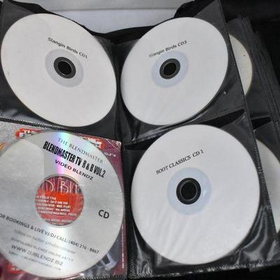 67 Music CDs in Case Logic. Mostly Rp & Hip Hop