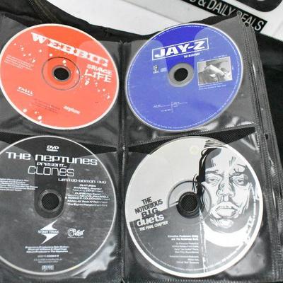 67 Music CDs in Case Logic. Mostly Rp & Hip Hop
