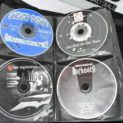 67 Music CDs in Case Logic. Mostly Rp & Hip Hop