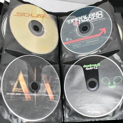 67 Music CDs in Case Logic. Mostly Rp & Hip Hop
