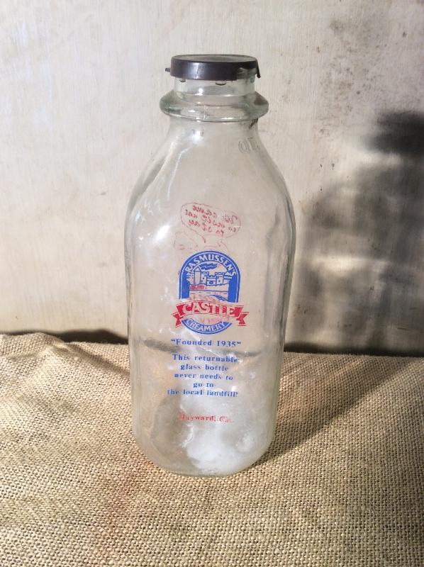 Rasmussen's Castle Creamery Milk Bottle w/Cap | EstateSales.org