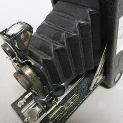 Lot 8 - Brownie Hawkeye Camera, Tasco Binoculars & Kodak Jr
