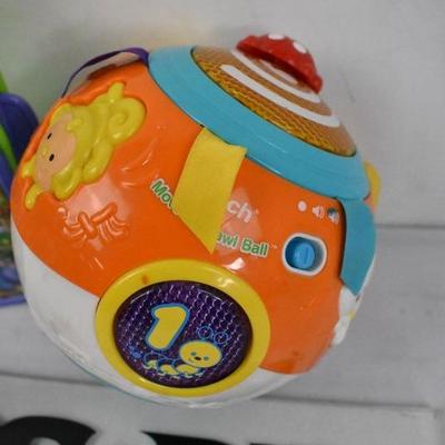 2 Infant/Toddler Vtech Toys: Winnie the Pooh Storybook and Move & Crawl Ball