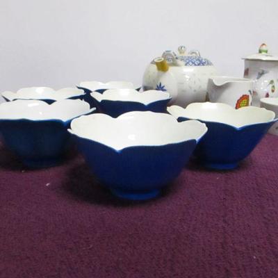 Lot 41 - China Tea Cups & Saucers & Bowls