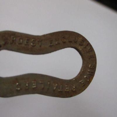 Lot 66 - G.R Kinney & J. C. Liken Company Button Shoe Hook