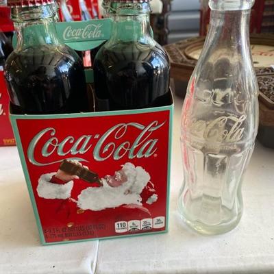 Lot 57 Coca Cola Santa Bottles 4 pk unopened 1 clear Coca Cola bottle