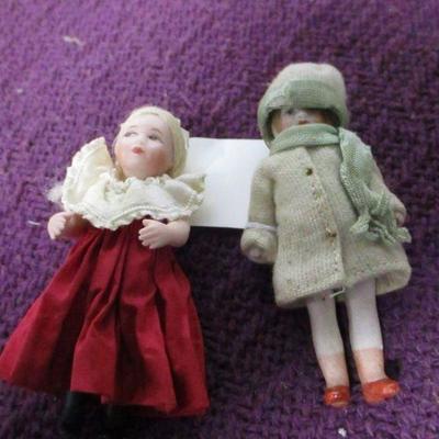 Lot 145 - 3 1/4" Hertwig Child Doll In Green Outfit