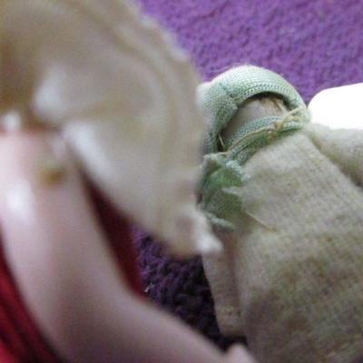 Lot 145 - 3 1/4" Hertwig Child Doll In Green Outfit