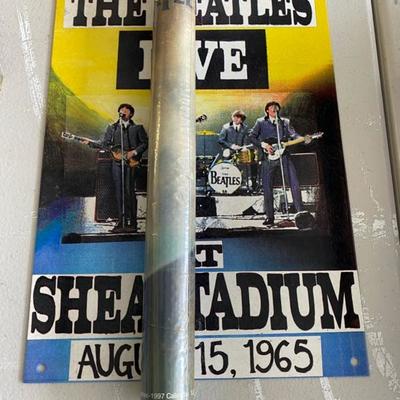 Lot 95 Beatles Metal Sign and unopened poster