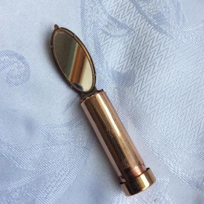 Old lipstick tube with mirror